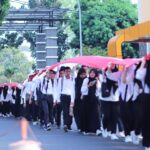 Ribuan Mahasiswa Unila Ikuti Kirab Bendera Merah Putih Wujud Cinta Tanah Air dan Bangsa