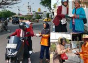 IMMawati FKIP UMKO Bagi-Bagi Nasi Kotak Pada Pekerja di Jalan