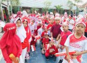 Ratusan Bendera Merah Putih Warnai Pawai Kemerdekaan di SDIT Iqro Gedong Tataan